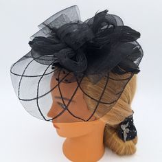 Discover the Exquisite Black Diamond Veil Fascinator Hat - a stunning combination of classic charm and contemporary style. This masterpiece is perfect for fashion enthusiasts who want to make a statement. The black diamond pattern adds sophistication, while the delicate goose feathers and glamorous black polka dot veil exude elegance and mystery. Whether you're attending a chic soirée, a Derby event, or a vintage-themed wedding, our Veil Fascinator Hat is the perfect accessory to enhance any outfit. It's crafted with meticulous attention to detail, ensuring both comfort and style. The lightweight design guarantees hours of comfortable wear. Wear the matching headband or use the hair clip to attach it to your hair. Embrace the allure of the Exquisite Black Diamond Veil Fascinator Hat, you'l Vintage Black Fascinator For Party, Structured Crown Black Headpiece For Wedding, Black Structured Crown Headpiece For Weddings, Black Short Brim Party Headpiece, Black Short Brim Headpiece For Party, Black Top Hat For Evening With Structured Crown, Black Top Hat With Structured Crown For Formal Occasions, Black Structured Crown Top Hat For Formal Occasions, Black Structured Crown Top Hat For Evening