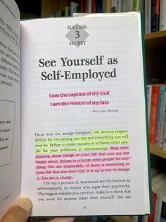 someone is holding up a book in front of bookshelves with text that reads see yourself as self - employees i am the captain of my soul