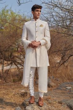 White sherwani with textured pattern. Paired with churidar. - Aza Fashions Designer Straight Kurta Sherwani For Wedding, Designer Traditional Wear For Wedding, Elegant Groom's Kurta With Cutdana Detailing, Elegant Groom's Kurta With Cutdana, Elegant Kurta With Dupatta For Groom, Elegant Groom's Kurta With Dupatta, Designer Nehru Jacket With Dupatta For Wedding, Designer Wedding Kurta With Dupatta, White Sherwani