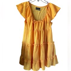 Urban Outfitters Bea Tiered Frock Yellow Babydoll Dress Size Xs Nwot Perfect For Casual Or Spring Dress Casual Cotton Tiered Dress With Ruffles, Tiered Cotton Mini Dress For The Beach, Cotton Tiered Mini Dress For Beach, Short Sleeve Tiered Ruffle Dress For Beach, Cotton Tiered Dress With Ruffle Hem For Beach, Beach Tiered Cotton Dress With Ruffle Hem, Short Sleeve Tiered Dress With Ruffle Hem For Beach, Cotton Tiered Mini Dress For Vacation, Beach-ready Cotton Mini Length Tiered Dress