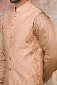 Peach bundi with printed motifs, floral embroidered motifs and patch pocket. Paired with Chanderi kurta and pant.
Component: 3
Printed
Neckline: Band
Sleeve Length: Full
Fabric: Chanderi, Cotton Silk Satin
Color: Peach
Front button placket - Aza Fashions Designer Chikankari Embroidery Kurta For Spring, Designer Spring Kurta With Chikankari Embroidery, Spring Wedding Nehru Jacket With Printed Motifs, Traditional Spring Bandhgala With Printed Motifs, Spring Designer Nehru Jacket With Printed Motifs, Spring Nehru Jacket With Printed Motifs For Designer Wear, Spring Nehru Jacket With Printed Motifs, Designer Embroidered Sherwani For Spring, Spring Straight Kurta With Tonal Embroidery