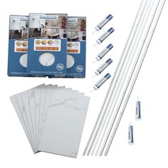 the package includes six different tools for making ceramic tiles and four pieces of white marble