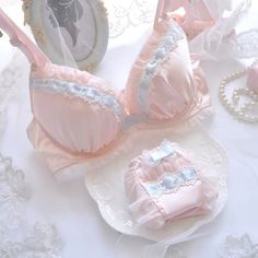 2-piece Satin Lolita Lingerie Set featuring wire free padded satin bra with ruffle & ribbon accents and matching bottoms. Available in burgundy dark red, peach-pink and neutral-taupe. Pink Bras, Satin Bra, Dress Party Night, Cute Bras, Floral Bodycon, Satin Lingerie, Custom Made Clothing, Bodycon Floral Dress, Flower Embroidery