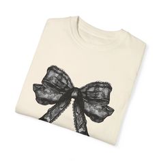 Our Halloween Lace Bow Comfort Colors Tee is the perfect way to celebrate the spooky season in style. This design is professionally printed via direct to garment process on a Comfort Colors t-shirt. Its super soft and the perfect thickness that won't show through! We recommend ordering your true t-shirt size. Kourtney is in a size medium. This shirt offers a relaxed fit for women as it is unisex. 100% ring-spun US cotton for long-lasting comfort. This item is ready to ship. Lace Bows, Comfort Colors Tee, Last Call, T Shirt Top, Tshirt Colors, Comfort Colors, Shirts Tops, Graphic Tees, Relaxed Fit