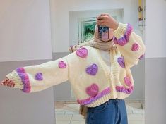 100% Hand knitted heart chunky cardigan (cardi/jacket) in cute pink heart style. ･Oversized XS-S: Length: 48-50 cm Neck to wrist: 66-70 cm Shoulder To Shoulder: 58 cm Oversized M-L: Length: 50 cm Neck to wrist: 74 cm Shoulder To Shoulder: 66 cm Oversized XL-XXL: Length: 50 cm Neck to wrist: 75 cm Shoulder To Shoulder: 70 cm ..There may be 2-3 cm difference according to manual measurement  (Model Size: M-L Height: 172 cm Weight: 58 kg) ･Packaging･ All of orders sends with carefully prepared gift Cute Winter Sweater With Heart Print, Cute Heart Print Winter Sweater, Cute Pink Heart Print Sweater, Oversized Heart-shaped Sweater For Winter, Cute Pink Knitted Outerwear, Cute Winter Knit Outerwear, Cute Knit Winter Outerwear, Cute Heart-shaped Winter Sweater, Trendy Winter Sweater With Heart Design