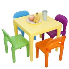 children's plastic table and chairs with fruit on plate