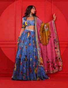 Editor's Note Elevate your style with this exquisite printed satin lehenga set, a fusion of luxurious fabric and captivating design that ensures you stand out with sheer sophistication. Fabric: Organza, shantoon Color: Blue Components: Lehenga, blouse and dupatta Occasion: Festive Note: Product colour may slightly vary due to photographic lighting sources Care: Dry clean only About the Designer Mahima Mahajan has injected a breath of fresh air into the Indian fashion industry with her bespoke co Mahima Mahajan, Mirror Detail, Satin Lehenga, Pink And Mustard, Printed Lehenga, Set Saree, Vacuum Storage, Kurta Dress, Organza Dupatta