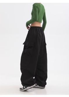 Features: Introducing the Women Punk Cargo Pants, perfect for the fashion-forward. Designed with a high waist and wide leg, these pants not only provide a flattering fit but also add a touch of streetwear edge to your wardrobe. Made with lightweight material, these pants are perfect for the summer season. Upgrade your style with these American Retro-inspired trousers. Y2k Style Wide Leg Relaxed Fit Bottoms, Y2k Wide Leg Relaxed Fit Bottoms, Y2k Wide Leg Bottoms With Relaxed Fit, Fall Y2k High-waisted Pants, Fall Y2k Style Trousers, Fall Y2k Trousers, High Waist Cargo Pants For Streetwear, Baggy Urban Style Parachute Pants With Wide Legs, Black Baggy Y2k Parachute Pants