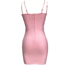 Introducing our stylish Pink Cocktail Dress, designed to make you stand out at any party or event. Made from high-quality satin fabric, this dress is not only comfortable but also durable. Its sleeveless design and mini length add a touch of allure to your look, while the natural waistline creates a flattering silhouette. The dress features a trendy strap neckline, adding a hint of sophistication. Its bodycon silhouette enhances your curves, making you feel confident and elegant. Crafted from breathable and sustainable polyester material, this dress is not only fashion-forward but also eco-friendly. The solid pink color adds a playful and feminine touch, perfect for the summer season. It comes in sizes XS-L to ensure a comfortable fit for every body type. Whether you're attending a club ni Sleeveless Satin Mini Dress With Built-in Bra, Pink Chic Mini Corset Dress, Pink Mini-length Chic Corset Dress, Chic Pink Mini Corset Dress, Flirty Club Dress With Built-in Bra, Feminine Fitted Sleeveless Dress With Spaghetti Straps, Feminine Sleeveless Mini Dress With Built-in Bra, Mini Bodycon Dress With Built-in Bra For Date Night, Pink Satin Mini Dress For Night Out