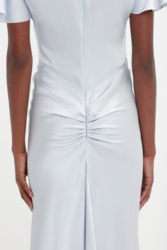 Understated but impactful, this elegant midi dress comes in a serene shade of Ice for the new season. Cut from a crepe back satin, it has an effortless drape, with a godet insert at the back adding extra flare. Design details include gathered channels at the shoulders, an exposed back waist seam and pleat detailing at the rear.Styled with the Flat Lace Up Mules Victoria Beckham Gathered Sleeve Midi Dress In Ice  - Size 12 UK Elegant Midi Dress, Size 12 Uk, Elegant Midi Dresses, Gathered Sleeves, Sleeve Midi Dress, Midi Dress With Sleeves, Victoria Beckham, Skirt Length, New Season