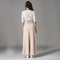 Wide Leg Pleated Cross Back Cropped Trousers Jumpsuit


Size Chart(Unit:cm/inch)


Size:S
Waist:66cm/25.98"
Leg length:85cm/33.4"
Length:94cm/37.0"


Size:M
Waist:68cm/26.77"
Leg length:86cm/33.8"
Length:96cm/37.8"


Size:L
Waist:70cm/27.56"
Leg length:87cm/34.2"
Length:98cm/38.58"


Note:
-Please allow 1-2cm measuring deviation due to manual measurement.- Please check the Size Chart before order. If you are not sure the size, please send message to us. Chic Full-length Jumpsuits And Rompers With Pockets, Chic High Waist Bottoms With Suspenders, Spring Stretch Jumpsuits And Rompers, Spring Stretch Trousers Jumpsuits And Rompers, Spring Stretch Jumpsuits And Rompers Trousers, High Waist Overalls For Spring, Chic Jumpsuit With Suspenders For Work, Chic Jumpsuits And Rompers With Suspenders For Work, Chic Spring Bottoms With Suspenders