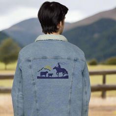 Elevate your denim game with this embroidered denim jacket. It's stylish, cozy, and made from 100% recycled materials including plastic bottles. Lined with warm and soft sherpa fabric, it's perfect for any season. Plus, the unique Copper Foal Designs embroidery adds a touch of fun to this timeless piece! • Denim: 99% cotton, 1% spandex • Sherpa & sleeve lining: 100% recycled polyester • Fabric weight: 12 oz/yd² (406.9 g/m²) • Chest pockets with button flap closure • Two side pockets • Regular fi Denim Sherpa Jacket, Sherpa Fabric, Christmas Phone Case, Embroidered Denim Jacket, Instagram Graphic, Western Design, Recycled Polyester Fabric, Personalized Phone Cases, Graphic Tops