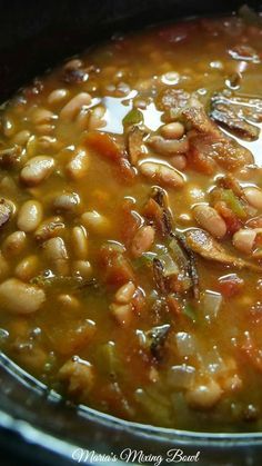 a bowl filled with beans and other food