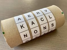 a roll of toilet paper with words on it sitting on top of a wooden table