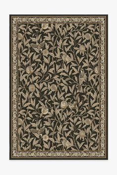 an intricately designed wall hanging with birds and flowers on black ground, in the middle of