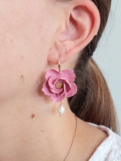 https://purplebeestudio.etsy.com Handmade elegant polymer clay floral earrings in trendy blush pink colour with freshwater pearls.  The delicate flowers are made by hand without using any molds. These featherlight earrings will compliment your outfit for different occasions. Great gift for special woman in your life.  Earrings made with brass ear wire. The earrings are very light and comfortable to wear. SHIPPING: Your order will be dispatched in a securely packed cardboard box. Product care:  - Bridal Party Earrings, Polymer Clay Flower Jewelry, Pearls Wedding, Flower Dangle Earrings, Delicate Flowers, Earrings Flower, Party Earrings, Pink Colour, Red Earrings