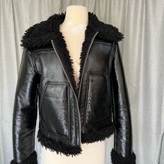 Very Good Condition Chic Leather Jacket With Zipper Closure For Cold Weather, Chic Leather Jacket With Zipper For Cold Weather, Spring Black Leather Jacket With Faux Fur Lining, Spring Leather Jacket With Zipper Closure For Cold Weather, Black Biker Jacket With Faux Fur Lining For Spring, Black Biker Jacket With Faux Fur Lining For Work, Spring Chic Biker Jacket For Cold Weather, Chic Black Leather Jacket With Faux Fur Lining, Black Biker Jacket For Spring