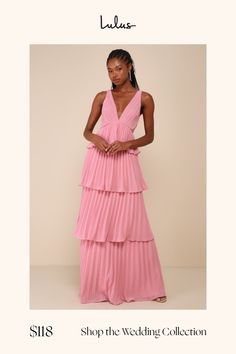 a woman in a pink dress with the words shop the wedding collection