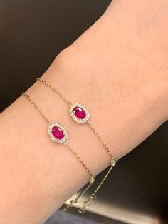 Model Number: RCE1PGX131 18K gold ruby bracelet Metal Stamp: 18k AU750 Metals Type: 18K Gold Weight/g: 1.57 Stone: Material Rubyd/1pc and Weight/ct 0.5 Side Stone: Diamond and Weight/ct 0.07 Metal Color: Yellow Gold Setting Type: Prong Setting Gender: Unisex Fine Ruby Bracelets Fine Jewelry For Formal Occasions, Ruby Bracelets For Formal Occasions, Fine Jewelry With Lab-created Ruby In Yellow Gold, Formal Ruby Bracelet Fine Jewelry, Yellow Gold Jewelry With Lab-created Ruby, Fine Jewelry Yellow Gold Lab-created Ruby, Ruby Bangle Bracelet In Yellow Gold, Yellow Gold Ruby Bangle Bracelets, Yellow Gold Ruby Diamond Jubilee Bracelet