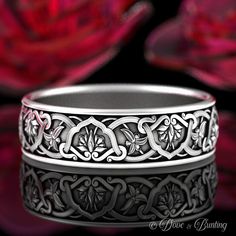 This lovely ring features delicate art nouveau floral design. The pattern is continuous all around the band, representing your unbreakable love. All our rings are made to order and made in YOUR specific size. We suggest buying our refundable ring sizer: https://www.etsy.com/listing/951097583 Cast in solid sterling silver, these rings are made of 100% recycled metal. The finish in the photos uses Patina to make the design stand out. All jewelry is made in the USA from recycled metal (better for t Victorian Engraved Ring With Decorative Band For Wedding, Vintage Filigree Ring With Decorative Band For Wedding, Art Nouveau Engraved Rings For Wedding, Silver Art Nouveau Rings With Intricate Design, Engraved Wedding Ring With Historical Design, Art Nouveau Filigree Ring, Art Nouveau Rings With Intricate Design, Art Nouveau Wedding Jewelry With Intricate Design, Art Nouveau Filigree Wedding Ring With Intricate Design