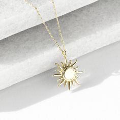 Burning sun figured, handmade 14 K yellow solid gold  tiny necklace. Comes with 14k gold chain. Standart chain length: 45 cm (17 inches) The size of sun is 13 mm (0,51 inches) diameter. Your lovely sun will arrive in a gift box. Choose your choice of chain lenght. Worldwide Shipping. (DHL/FEDEX/UPS/TNT) Please contact to me for any request. Feel the beauty of the sun with a gold sun necklace. It's been loved for ages. Wear it and feel warm, lively, and full of potential. Let the necklace shine o Sun Pendant Gold, Burning Sun, Sun Jewelry, Tiny Necklace, Sun Necklace, Sun Pendant, Gold Sun, Pendant Gold, Sunny Day