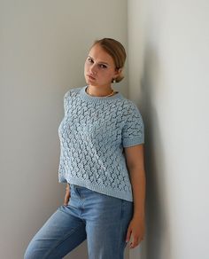 Italian cotton light blue summer short sleeve top. Hand made shimmering top perfect for warm summer weather. Casual Pointelle Knit T-shirt For Summer, Summer Cotton Pointelle Knit T-shirt, Summer Pointelle Knit T-shirt With Crew Neck, Cotton Knit Top With Short Sleeves, Relaxed Fit, Cotton Relaxed Fit Short Sleeve Knit Top, Relaxed Fit Cotton Knit Top With Short Sleeves, Relaxed Fit Short Sleeve Cotton Knit Top, Relaxed Fit Short Sleeve Knit Top, Cotton Pointelle Knit T-shirt With Crew Neck