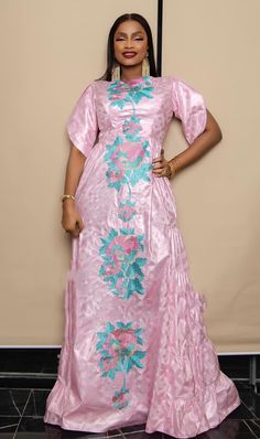 Description: This African  BROCADE  dress is perfect for any occasion you want to look your best.  PROCESSING: We usually take 4-5 BUSINESS DAYS to make the dress. SHIPPING: We use DHL shipping with tracking and text updates. (3 to 5 days) SIZING: What we need from you We have a sizing Chart in the images. Scroll to the right. (Providing your desired measurements for proper fitting ) BUST WAIST HIP SHOULDER SLEEVE LENGTH ARMHOLE Shoulder to waist Length of dress from shoulder to hem Length of skirt/wrapper from the waist to hem HEIGHT (Contact us if you need our custom measurements form ) Care Recommend: Machine wash cold / No bleach/Dry Clean/ Line dry Kindly note that due to variations in computer monitors, tablets, and/or mobile device settings, actual fabric colors may slightly differ Festive Fitted Pink Kaftan, Festive Pink Midi Dress, Fitted Pink Kaftan For Party, Fitted Long Evening Kaftan Dress, Fitted Pink Kaftan, Fitted Long Kaftan For Party, Fitted Long Dress Kaftan For Party, Pink Silk Floor-length Dress, Short Sleeve Kaftan For Party