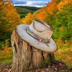 Custom wide brim distressed western hat. The hat brand is Charlie Horse. The hat band is a variety of different colors with turquoise accents. Colors With Turquoise, Concert Hat, Charlie Horse, Broken Bow, Western Hat, Turquoise Accents, Western Hats, Wide Brimmed Hats, Hat Band