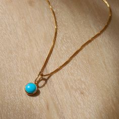 This gold necklace is set with a beautiful gemstone inspired pendant and your choice of cable or box chain. Great to wear solo as a minimal necklace or layered with other necklaces. 14K gold filled cable or box chain 14K gold filled synthetic turquoise pendant Pendant size: 6 mm Comes with 2" extender Nickel-free Jasmine Necklace, Minimal Necklace, Turquoise Pendant, Box Chain, Final Sale, Gold Filled, Gold Necklace, Cable, Necklaces