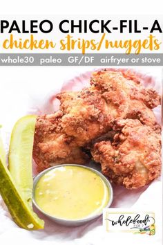 chicken strips with dipping sauce and pickle wedges on the side for $ 10