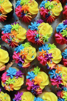 cupcakes decorated with colorful icing and sprinkles