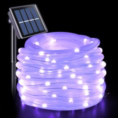 a solar powered garden light with blue lights