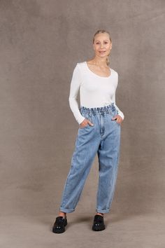 STYLE DETAILS: Introducing your new favourite jeans: the Meta Denim Pant, a definitive staple for your wardrobe. Boasting a high-rise paper bag waist, a relaxed fit, and ankle-length coverage, these jeans are designed for seamless mixing and matching, ensuring endless versatility and practicality for your everyday style. Wear them cuffed or uncuffed—your ideal companion for effortless looks. FEATURES: Mum Jeans High rise Paperbag waist Button closure Zipper fly Side and patch pockets Ankle-lengt Mum Jeans, Unique Fits, Denim Pant, Everyday Style, High Jeans, Favorite Jeans, Denim Fashion, Ankle Length, How To Introduce Yourself