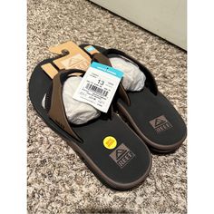 Nwt Reef Men's Fanning Sandals Brown Slides With Ortholite Insole And Round Toe, Brown Synthetic Slides With Cushioned Footbed, Brown Textured Footbed Flip Flops For Outdoor, Brown Synthetic Flip Flops With Textured Footbed, Brown Textured Flip Flops For Outdoor, Brown Slip-on Flip Flops For Outdoor, Brown Synthetic Round Toe Flip Flops, Brown Cushioned Flip Flops With Round Toe, Brown Synthetic Flip Flops For Outdoor