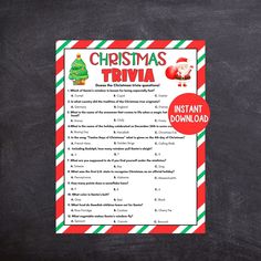 a christmas trivia game on a blackboard with red, green and white stripes