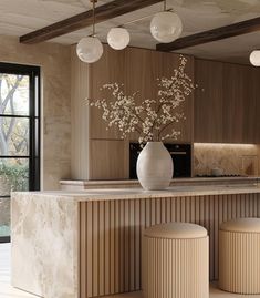 a kitchen with marble counter tops and stools