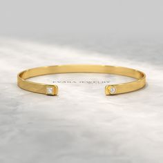 Indulge in timeless elegance with our exquisite Diamond Solitaire Cuff Bracelet. Crafted from radiant 10K, 14K, or 18K solid gold, this cuff exudes sophistication. Its shimmering lab-grown diamond, meticulously set in a prong setting, captivates with its brilliance. Wear it as a statement piece or a cherished keepsake, this custom cuff bangle bracelet is a testament to your impeccable taste. 𝐅𝐞𝐚𝐭𝐮𝐫𝐞𝐬: * 𝐌𝐚𝐝𝐞 𝐭𝐨 𝐎𝐫𝐝𝐞𝐫 * 𝐌𝐞𝐭𝐚𝐥: 𝟏𝟎𝐊 𝐆𝐨𝐥𝐝 | 𝟏𝟒𝐊 𝐆𝐨𝐥𝐝 | 𝟏𝟖𝐊 𝐆? Elegant Formal Bangle With Single Diamond, Timeless Formal Bangle With Single Diamond, Elegant 14k Gold Bangle With Single Diamond, Formal Fine Jewelry Bangle With Single Diamond, Formal 14k Gold Jubilee Cuff Bracelet, Gold Wedding Bracelet With Single Diamond, Classic Diamond Cuff Bracelet For Formal Occasions, Wedding Gold Bracelet With Single Diamond, Gold Bracelet With Single Diamond For Wedding