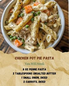 a bowl of chicken pot pie pasta with peas and carrots in it on a wooden table