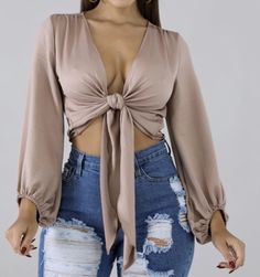 This top is perfect for your girls night, date, night, happy hour. It features a cozy stretch satin material with a ruffled elasticized end sleeve. Wear this with your perfect Jeans and make an effortless aappearance Trendy Satin Crop Top, Flirty Satin Top For Party, Glamorous Satin Top For Night Out, Stretch Satin Crop Top For Night Out, Feminine Long Sleeve Satin Tops, Chic Satin Stretch Crop Top, Stretch Satin Tops For Date Night, Trendy Satin Blouse For Fall, Feminine Tops For Party