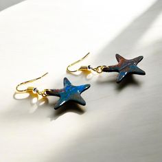 One of a kind Handpainted starfish drop earrings on gold ear wire Ear Wire, Starfish, Jewelry Earrings Dangle, Dangle Drop Earrings, Dangle Earrings, Jewelry Earrings, Hand Painted, Drop Earrings, France