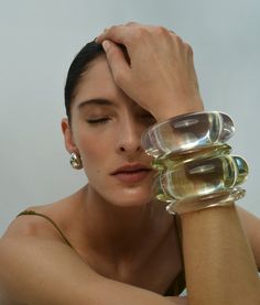 Show ’em your stack! This thin domed cuff bracelet in clear resin looks stellar worn solo or stacked together. Hoop Charms, Lizzie Fortunato, Classic Brides, Blue Topaz Stone, Fall Accessories, Topaz Stone, Green Amethyst, Fine Earrings, Arm Candy