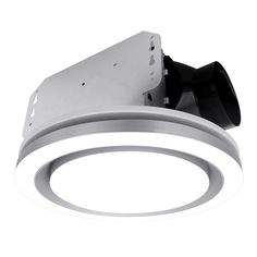 a white ceiling light with an electronic device on it's side and a black object in the middle