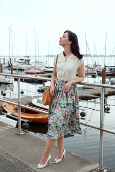 This skirt, based on an original template from the 50s, is sewn from cotton with Amalfi Coast pattern. Tightly cut and ruffled at the waist, the skirt provides a dreamlike silhouette and swings wonderfully when dancing. The skirt reaches, as usual in the 50s, to the middle of the calf and is closed at the back with a concealed zipper and glass button. Materials used: 100% cotton, glass button All my things are made to measure. The selection of clothing sizes is for guidance only. Do you have spe Summer Dresses With Gathered Skirt And Fitted Waist, Summer Cotton Dress With Flared Skirt, Summer Cotton Flared Dress, Cotton Flared Skirt Summer Dress, Summer Daywear Dress With Flared Skirt, Fitted Skirt For Summer Daywear, Fitted Summer Skirt For Daywear, Summer Cotton Dress With Pleated Skirt, Summer Cotton Pleated Dress