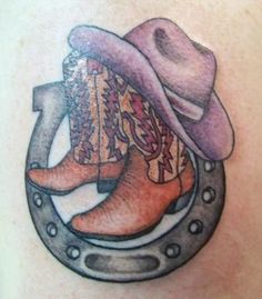 an image of a tattoo with cowboy boots on it