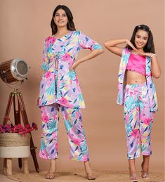 Mother's Co Ord Set:-Readymade Modal Satin Crop Top with Jacket in Multicolor. This attire with Cotton Lining is Enhanced with Tassels and Floral Print . Crafted in Sweetheart Neck and Half Sleeve. Available with a Modal Satin Palazzo and Modal Satin Jacket in Multicolor along with Pockets. Jacket Length is 32 inches Do note: Accessories shown in the image are for presentation purposes only and length may vary upto 2 inches.(Slight variation in actual color vs. image is possible). Daughter's Co Pink Matching Summer Sets, Spring Family Matching Pink Sets, Family Matching Pink Sets For Spring, Satin Co Ord Set, Crop Top With Jacket, Top With Jacket, Vs Image, Angrakha Style, Satin Crop Top