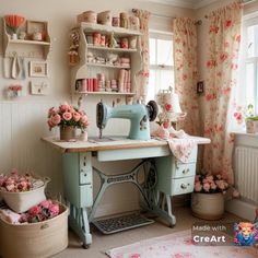 a sewing machine sitting on top of a table in a room with pink flowers and curtains