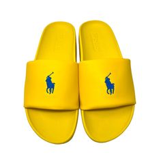 Polo Ralph Lauren Men’s Polo Pool Slide Sandals Sizes: Men’s 9, 11, 12, 13 Color: Yellow With Blue Pony New With Tags These Classic Pool Slides Feature Ralph Lauren’s Iconic Pony. A Padded Eva Construction Provides Extra Support And Comfort. Open Toe. Slip-On Styling. Padded Footbed. Eva Midsole. Ralph Lauren's Signature Polo Player Debossed At The Top. * Embossed Design * Padded Insole * Treaded Rubber Sole * 100% Synthetic Leather Upper * 100% Fabric Lining * 100% Authentic Ob Yellow Sporty Slides For Summer, Polo Slides Men, Yellow Non-slip Slides For Summer, Polo Ralph Lauren Slippers, Yellow Non-slip Casual Slides, Aqua Logo, Polo Ralph Lauren Shoes, Ralph Lauren Jacket, Camo Men