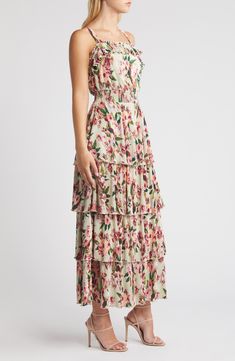 Move sweetly from day to night in this flowery maxi accented with floaty ruffles and fine pleats. 52 1/2" length (size Medium) Slips on over head Square neck Sleeveless Side-seam pockets Partially lined 100% polyester Hand wash, dry flat Imported Maxi Length Ruffled Skirt Dress For Garden Party, Fitted Ditsy Floral Print Tiered Skirt Dress, Flowy Floral Dress With Ruffle Hem And Tiered Skirt, Summer Long Floral Dress With Ruffles, Garden Party Midi Maxi Dress With Ruffled Skirt, Spring Dress With Flowy Skirt And Ruffle Hem, Floral Print Tiered Skirt Dress For Garden Party, Spring Long Ruffled Dresses, Floral Tiered Skirt Dress With Ruffles For Garden Party