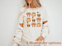 Embrace the cozy vibes of autumn with our retro fall pumpkin spice shirt. Featuring a charming bow-adorned pumpkin design, this shirt perfectly captures the essence of the season. Ideal for pumpkin spice lovers and bow aesthetic enthusiasts, it makes a delightful gift for the fall season. SHIRT DETAILS: -  Made from very soft materials  - 100% cotton for solid colors  - Heather colors and sports grey include polyester  - The shoulders have twill tape for improved durability.  - There are no side Cute Fall T-shirt For Gift, Fall Short Sleeve Tops For Gifts, Fall Short Sleeve Tops For Gift, Short Sleeve Tops For Fall Gift, Fall Season T-shirt Gift, White T-shirt For Fall Season Gift, White T-shirt For Fall Gift, White T-shirt As A Fall Gift, Fall Gift T-shirt With Short Sleeves