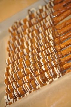 there are many pretzels on the tray ready to be cooked in the oven